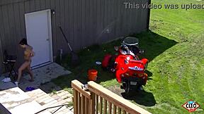 Cleo's anal pleasure with a dildo in the backyard