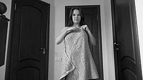 Big-titted milf with curly hair and a nice ass pees at home in amateur video