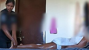client relaxes during soothing handjob massage at upscale spa retreat