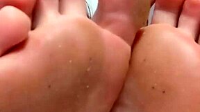 goth slut with tats sucks toes gives footjob on big monster cock dildo bath play...