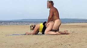 muscular guy bends over huge ass blonde milf on beach island fucking her gaping pussy publicly