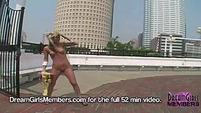 Tanned amateur flashes shaved pussy outdoors then masturbates