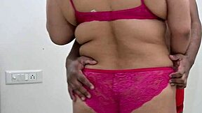 Bikini ebony shakes huge saggy tits giving hubby handjob