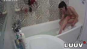 Luuv Elika spreads legs wide, shaves smooth in bathroom for voyeur cam.
