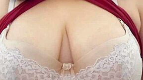 Her Massive Natural Tits Tease Fans in Steamy Striptease