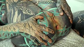 Tattooed babe's shaved pussy and ass gaped by monster cock in bedroom