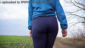 Milf's Tight Ass Teases in Yoga Leggings from Behind