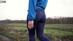 Milf's Tight Ass Teases in Yoga Leggings from Behind