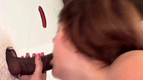 pervy emma ash squeezes huge chocolate cock at glory hole!!