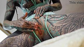 Tattooed babe's shaved pussy and ass gaped by monster cock in bedroom