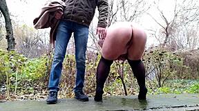 Curvy stepmother pisses on stepson again in pantyhose on street