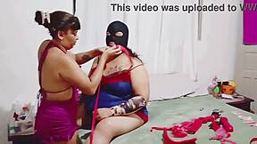 Fanny Prado and masked slut play with toys strap on her collar to lick fat pussy