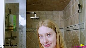 Bright-Eyed Blonde Enters Shower for Petite Lesbian Massage Interview.
