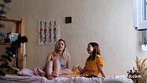 hey these hot lesbian babes strap on and fuck shaved pussies turn by turn