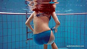 Martina's tight pussy throbs in blue bikini underwater, you watching?