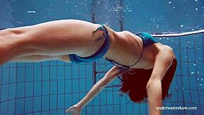Martina's tight pussy throbs in blue bikini underwater, you watching?