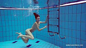 Martina's tight pussy throbs in blue bikini underwater, you watching?