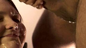 she delivers a super close-up blowjob ending with cum flooding her mouth as she rims him