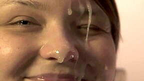 she delivers a super close-up blowjob ending with cum flooding her mouth as she rims him