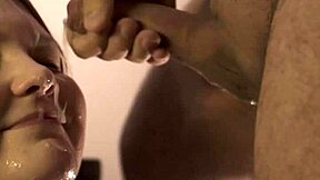 she delivers a super close-up blowjob ending with cum flooding her mouth as she rims him