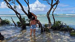 two pretty latinas kiss big asses on public beach