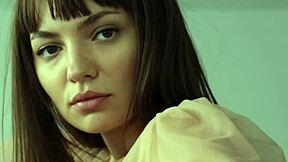 Petite Romanian brunette Ana Tomaunuu strips intimately revealing skinny body and natural tits