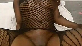 Big black babe stretches wet pussy on monster dragon dildo during oily massage