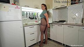 Sexy pantyhose housewife brunette ass feet legs fetish cleans kitchen homemade amateur teen wife