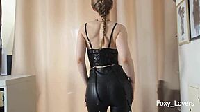sexy housewife in tight leather corset jerks my cock till i explode all over her latex pants
