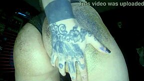 Sparkling oil glistens on massive curvy ass massage