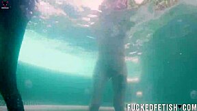 submissive couple helen star gives oral underwater with vibrator at pool