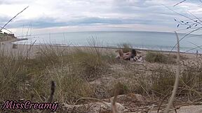 French teacher slut flashes small tits on nude beach, sucks stranger's monster cock publicly with cumshot