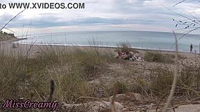 French teacher slut flashes small tits on nude beach, sucks stranger's monster cock publicly with cumshot