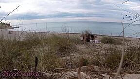 French teacher slut flashes small tits on nude beach, sucks stranger's monster cock publicly with cumshot