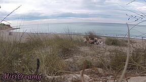 French teacher slut flashes small tits on nude beach, sucks stranger's monster cock publicly with cumshot