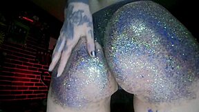 Sparkling oil glistens on massive curvy ass massage
