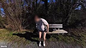 Curvy milf flashes huge saggy tits and big pussy on crowded public bench