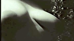 Vintage milf mommy bares hairy beaver and natural tits in retro nature scene.