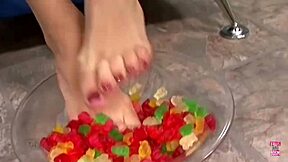 i stick my feet in gummy bears for kinky footjob on tight pussy licking deepthroat cowgirl riding cumshot brunette tattoo