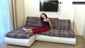 Flexible Croatian gymnast Milana raises legs high in acrobatic nude stretching pose again