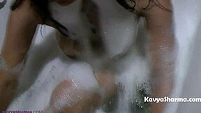 Horny Indian Auntie's Big Tits Soak in Steamy Shower Show!