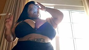 bbw mary jhuana flashes huge tits smoking at motel window exhibitionist style