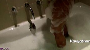 Horny Indian Auntie's Big Tits Soak in Steamy Shower Show!