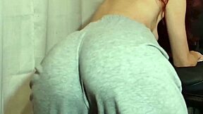 The cute skinny amateur shakes her big hairy ass while twerking on webcam close up