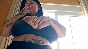 bbw mary jhuana flashes huge tits smoking at motel window exhibitionist style