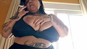 bbw mary jhuana flashes huge tits smoking at motel window exhibitionist style