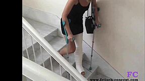 i hobble on my cast leg outdoors in leggings for kinky spanking pain