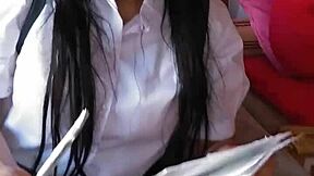 What secrets hide behind this amateur Asian schoolgirl's innocent homemade tease?