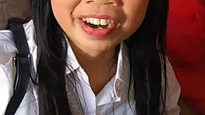 What secrets hide behind this amateur Asian schoolgirl's innocent homemade tease?