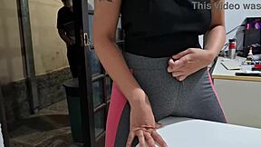 Neighbor helps tease her camel toe on the desk table